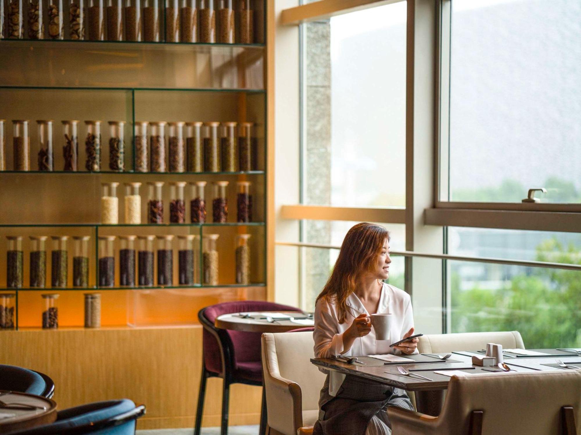 Novotel Jinji Lake Suzhou Sip Buitenkant foto